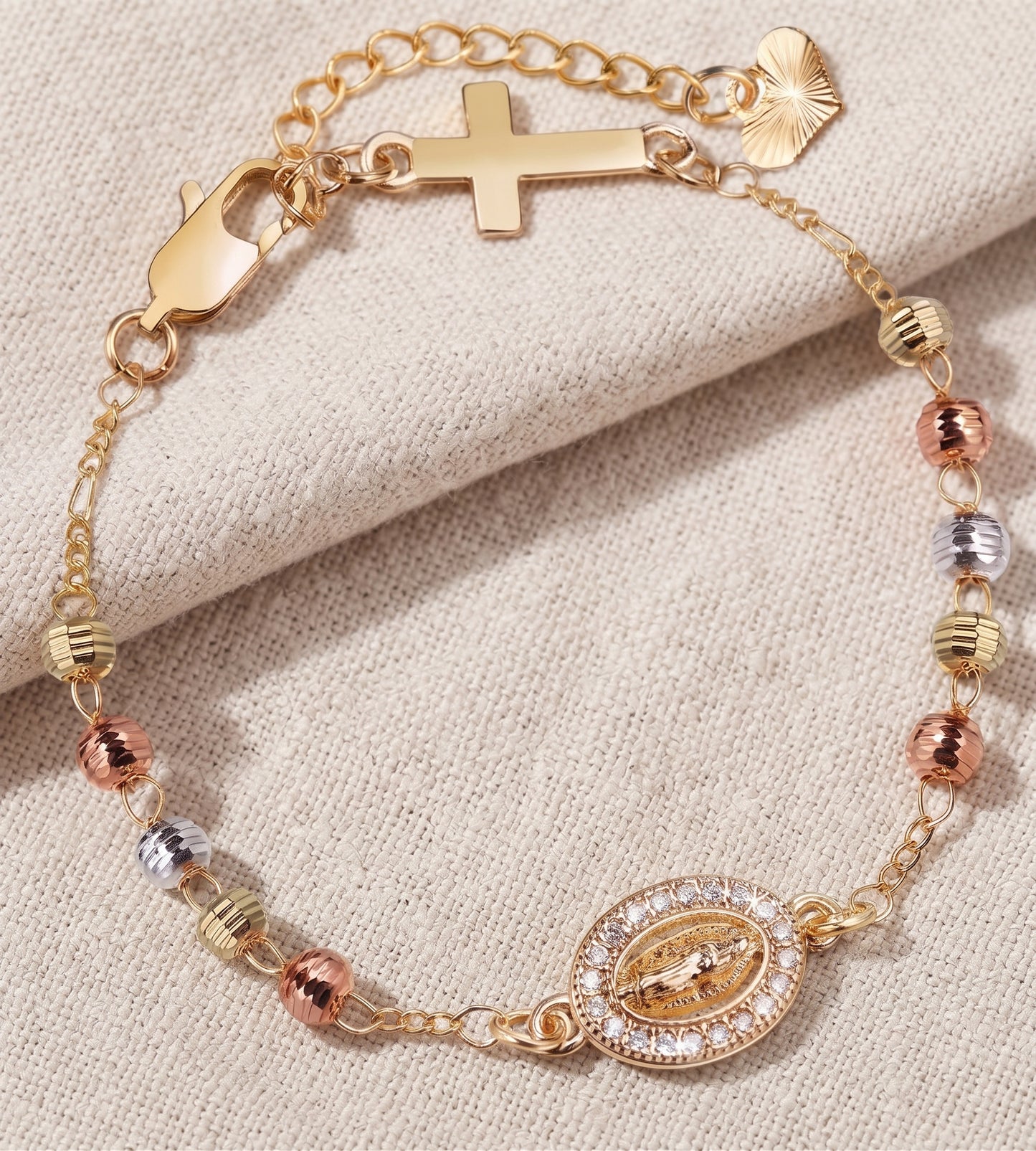Pulsera bronce con cruz y medalla mariana, joyería Aura Sacra